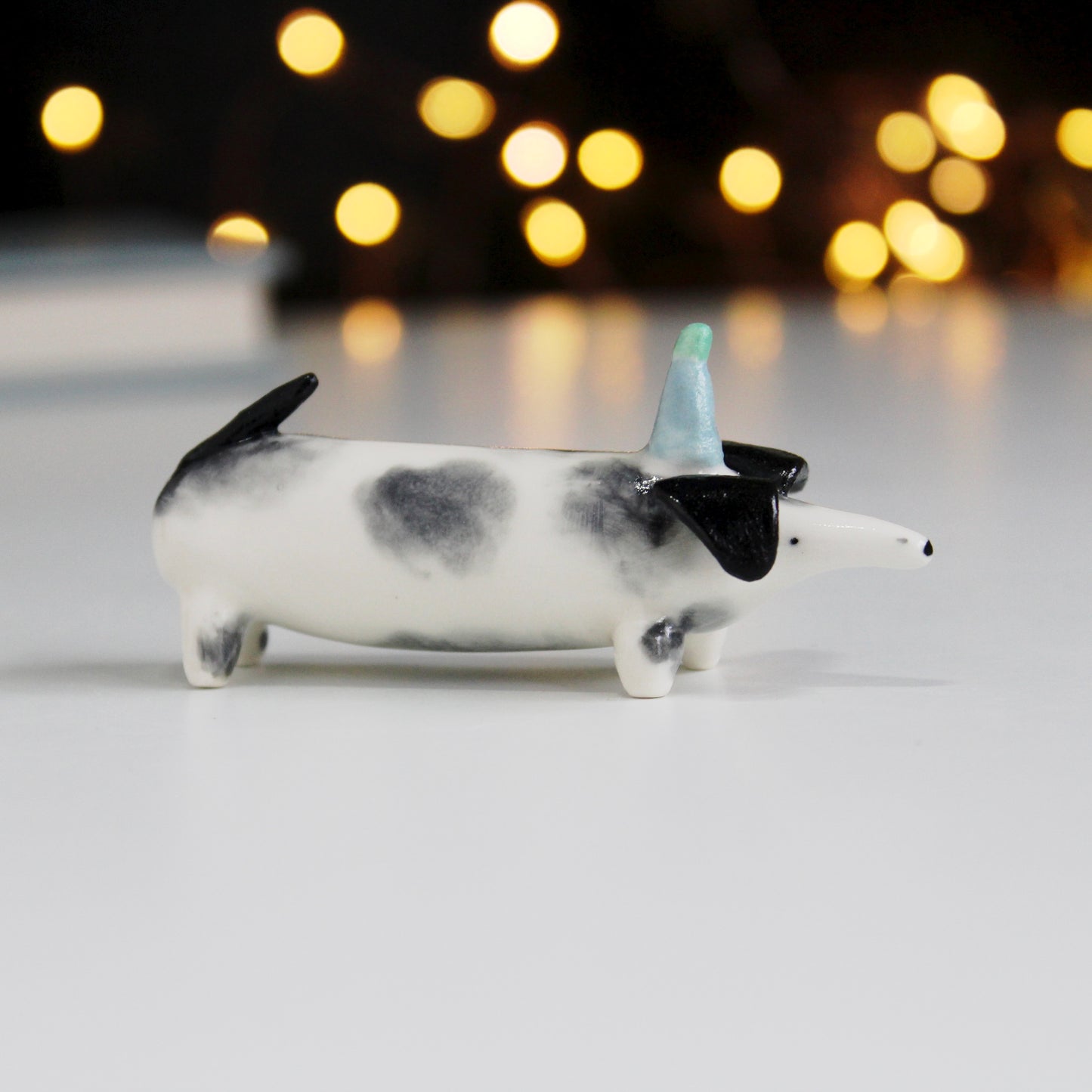 Sausage dog in party hat ornament