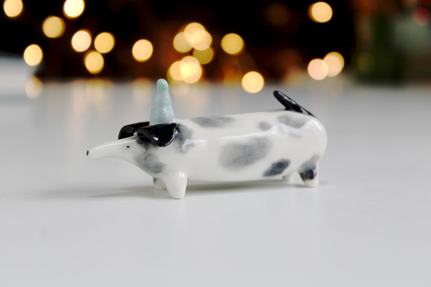 Sausage dog in party hat ornament