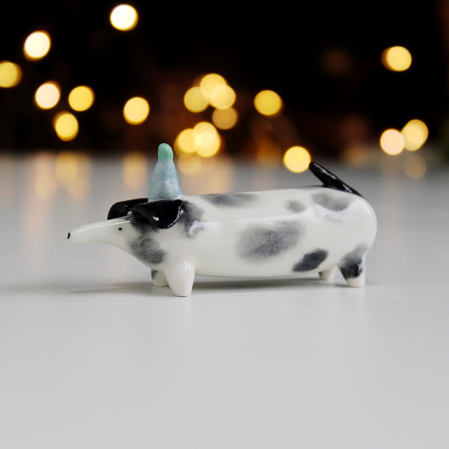 Sausage dog in party hat ornament