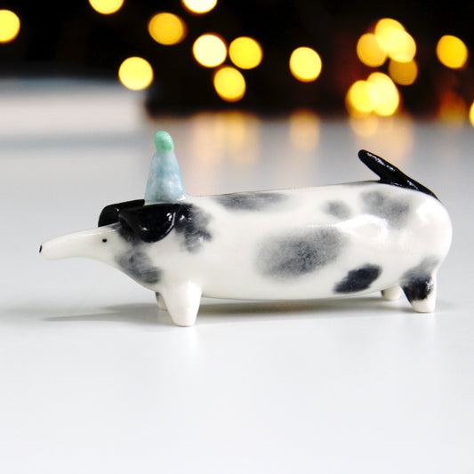 Sausage dog in party hat ornament